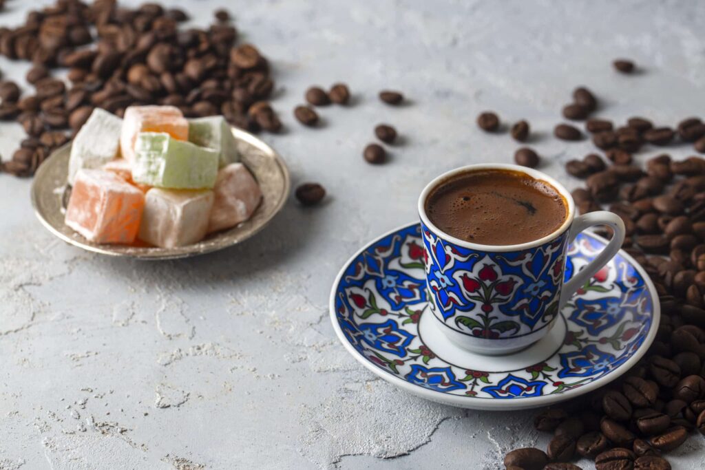 Traditional Turkish coffee and Turkish delight served in decorative ceramic cups in Turkey